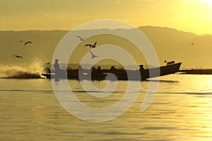 Tourist traditional boat on Inle Lake