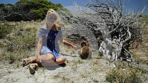 Tourist with two Quokka