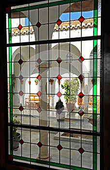 Stained glass window in the patio of the Tourist Villa of Zagrilla -Villa Turistica- of Priego de Cor photo