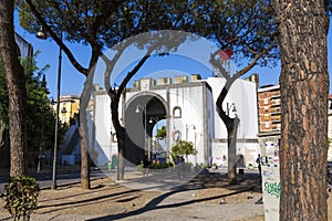 Tourist visiting the Porta Capuana and the park