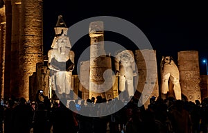 Tourist visiting the Temple of Luxor at night in Luxor, Thebes, Egypt