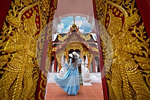 Tourist visiting at Wat Khua Khrae in Chiang rai, Thailand photo