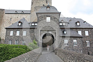 Tourist walks into the castle