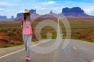 Tourist walks in the Monument valley photo