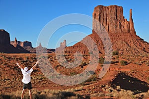 The tourist in a white shirt in Monument Valley