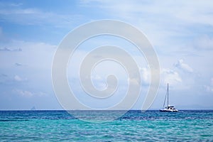 Tourist white yacht sailing in the beautiful ocean in Phuket, Th