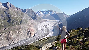 Tourist woman at Alpine Glacier