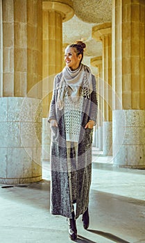 Tourist woman in Barcelona, Spain in winter enjoying promenade