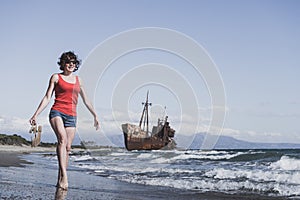 Tourist woman on beach enjoying vacation