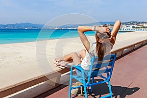 Tourist woman in Cannes, Cote d`Azur, France, South Europe. Nice city and luxury resort French riviera. Famous tourist destinatio