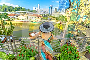 Tourist woman at Clarke Quay