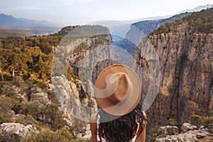 Tourist woman on the edge of a cliff of Tazi Canyon in Manavgat, Antalya, Turkey. Greyhound Canyon, Wisdom Valley.