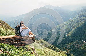 Tourist woman enjoy with beautiful view on mountains in Ella, Sri Lanka, Little Adam Peak photo