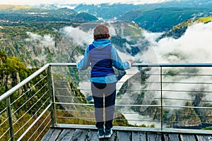 Tourist woman enjoy mountain view. River Sil Canyon, Spain