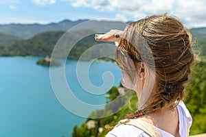 Tourist Woman Enjoying View of Lake Bled