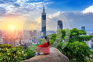 Tourist woman enjoying view on mountains in Taipei, Taiwan.