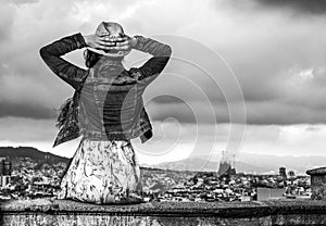 Tourist woman in front of city panorama of Barcelona relaxing