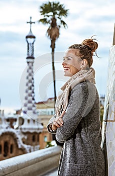 Tourist woman at Guell Park in Barcelona exploring attractions