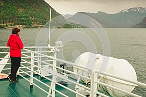 Tourist woman on liner in Norway