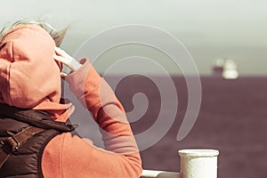 Tourist woman on liner seascape background