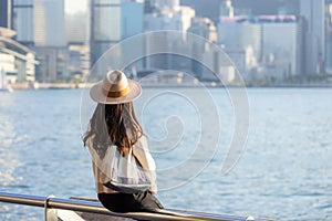 Tourist woman look at city of Hong Kong