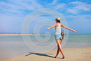 Tourist woman at the Red Sea coast and mangroves in the Ras Mohammed National Park. Famous travel destionation in desert. Sharm el photo