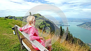 Tourist woman at Rigi Scheidegg bench