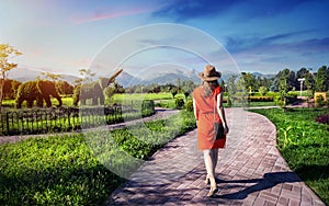 Tourist Woman Topiary Garden