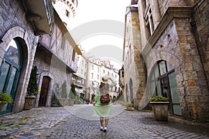 Tourist woman is traveling inside French village on Bana Hills in Danang