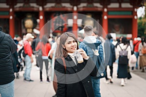 Tourist woman visit Sensoji Temple or Asakusa Kannon Temple is a Buddhist temple located in Asakusa, Tokyo Japan. Japanese