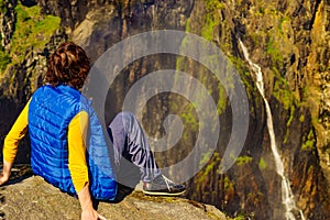 Tourist woman at Voringsfossen waterfall Norway