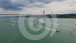 Tourist yachts sailing river at gloomy day aerial view. Lisboa marine cityscape