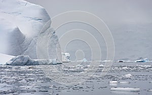 Tourist in a zodiac traveling in antarctic waters