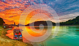 Touristic boat at sunset. Beautiful landscape. Luang Prabang. La