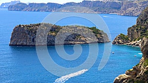 Aerial view of the coastline of Javea with the little Descubridor islet. photo