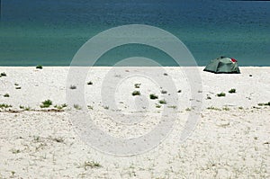 Touristic tent on the sea coast of wild island