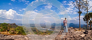 Tourists admire the atmosphere, sky and clouds on the mountain at Pha Chanadai, Ubon Ratchathani.