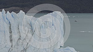 Tourists Approaching the Majestic Perito Moreno Glacier by Boat