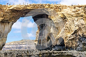 Tourists on the Azure Window Arch