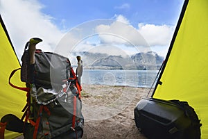 Tourists backpack in the tent with segara anak lake view