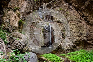 Tourists at Barranco del Infierno waterfall photo