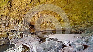 Tourists on Beach in Rio Frio Caves, Belize photo