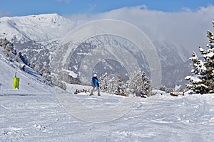 Tourists at the beginning of the descent to the ski resort in th