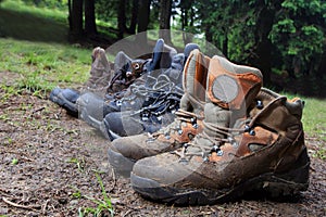 Tourists boots in forest camp