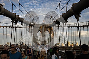 Tourists on the Brooklyn Bridge at Dusk