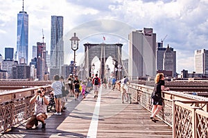 Tourists on the Brooklyn bridge, NYC, USA