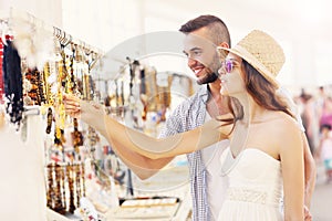 Tourists buing souvenirs