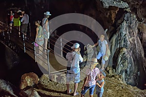 Tourists in the cave