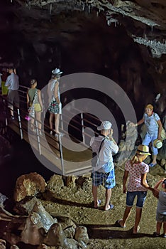 Tourists in the cave