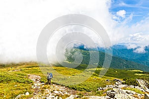 Tourists climb to the top